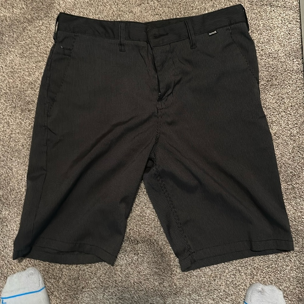 Only worn a few times these are black with white pin stripes.